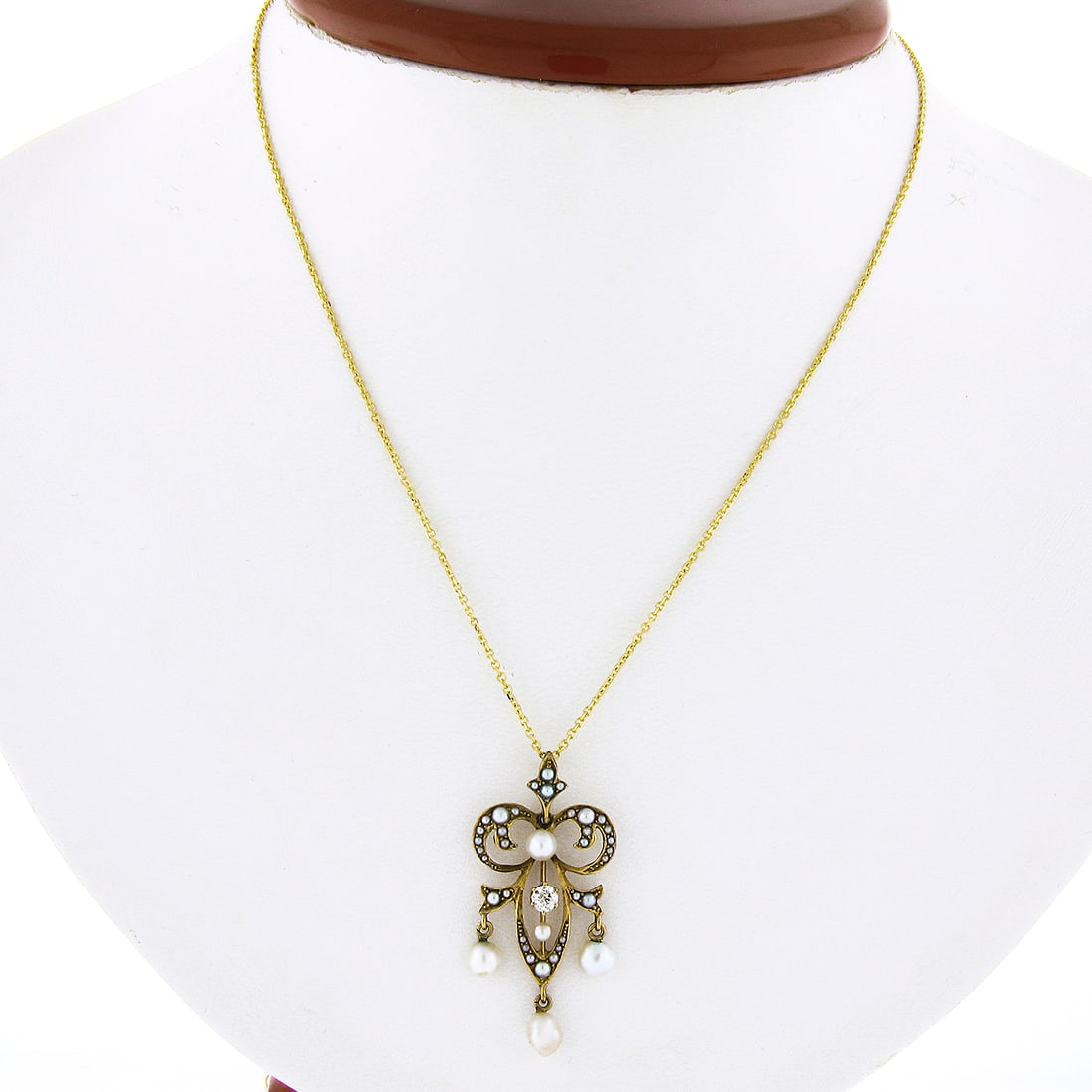 Victorian 14K Yellow Gold Lavalier Pendant Necklace Diamond Seed Pearls: Victorian 14K Yellow Gold Lavalier Pendant Necklace Diamond Seed Pearls This antique Victorian lavalier pendant necklace is crafted from solid 14K yellow gold and features a chandelier design. The pen