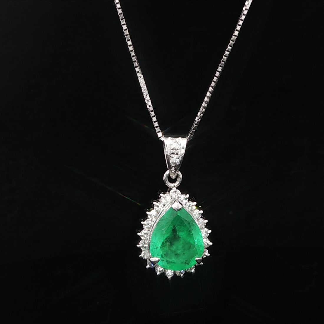 GIA Certified 2.51ct Colombian Emerald Diamond Pendant Necklace in Platinum: GIA Certified 2.51ct Colombian Emerald Diamond Pendant Necklace in Platinum This exquisite pendant necklace features a stunning natural Colombian emerald, expertly cut in a pear shape and weighing 2.1