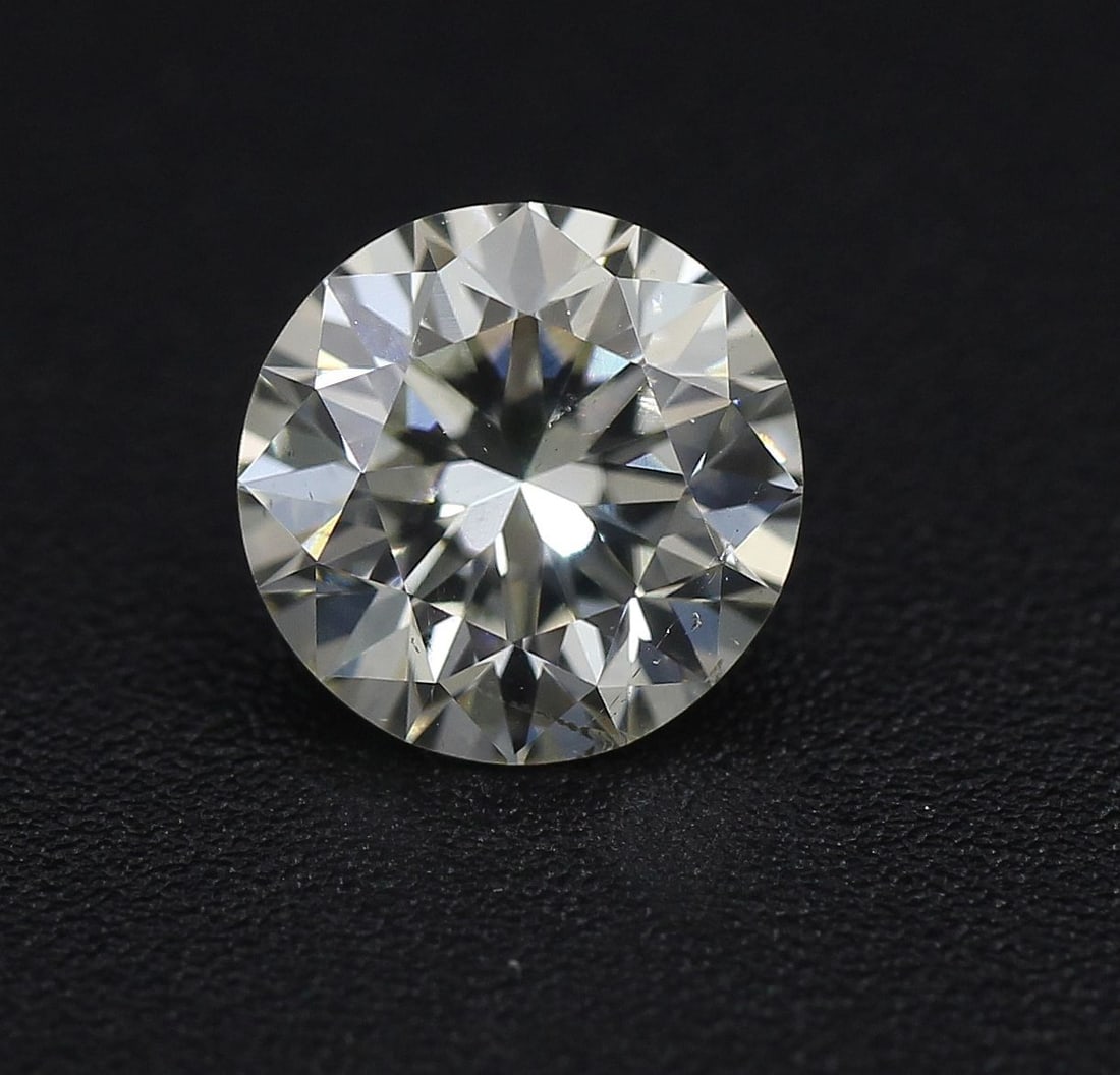 Loose Diamond - ROUND 0.92ct K SI1: Loose Diamond - ROUND 0.92ct K SI1 Source: Natural Shape: ROUND Carats: 0.92 Color: K Clarity: SI1 Certification: EGL The Diamond Depot Guarantee: All items in this auction are guaranteed to be 100% a