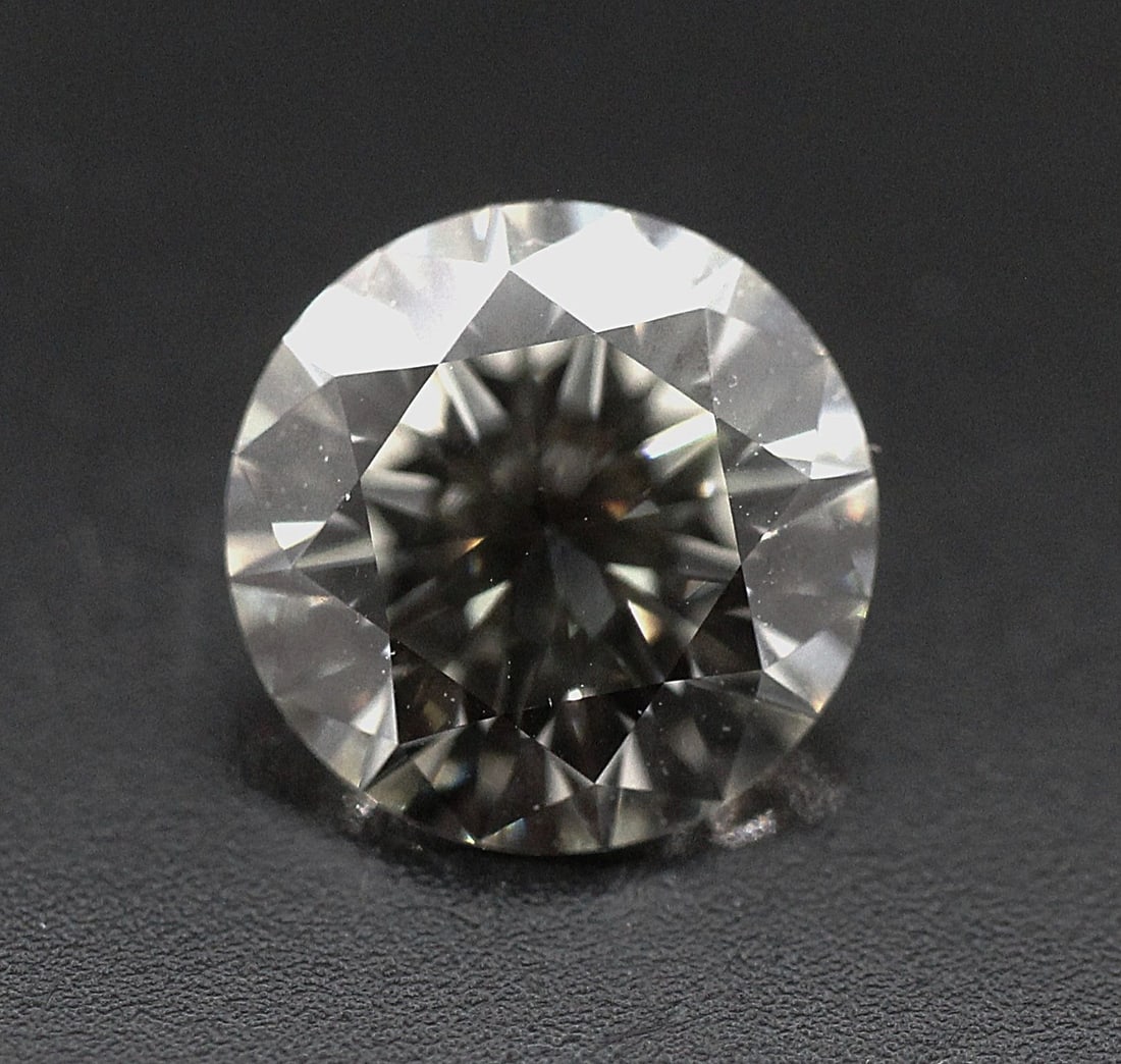 Loose Diamond - ROUND 2.19ct K VS2: Loose Diamond - ROUND 2.19ct K VS2 Source: Natural Shape: ROUND Carats: 2.19 Color: K Clarity: VS2 Certification: EGL The Diamond Depot Guarantee: All items in this auction are guaranteed to be 100% a