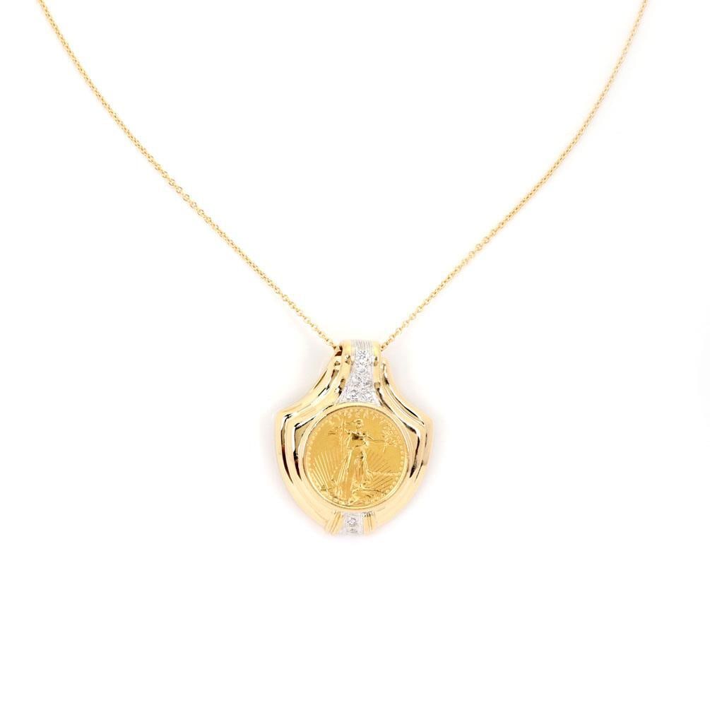 22k Gold Liberty Coin Pendant with 14k Gold Frame and 18k Chain: 22k Gold Liberty Coin Pendant with 14k Gold Frame and 18k Chain This exquisite necklace features a classic pendant crafted from a 14k yellow gold frame, elegantly accented with a 10-point diamond. At 