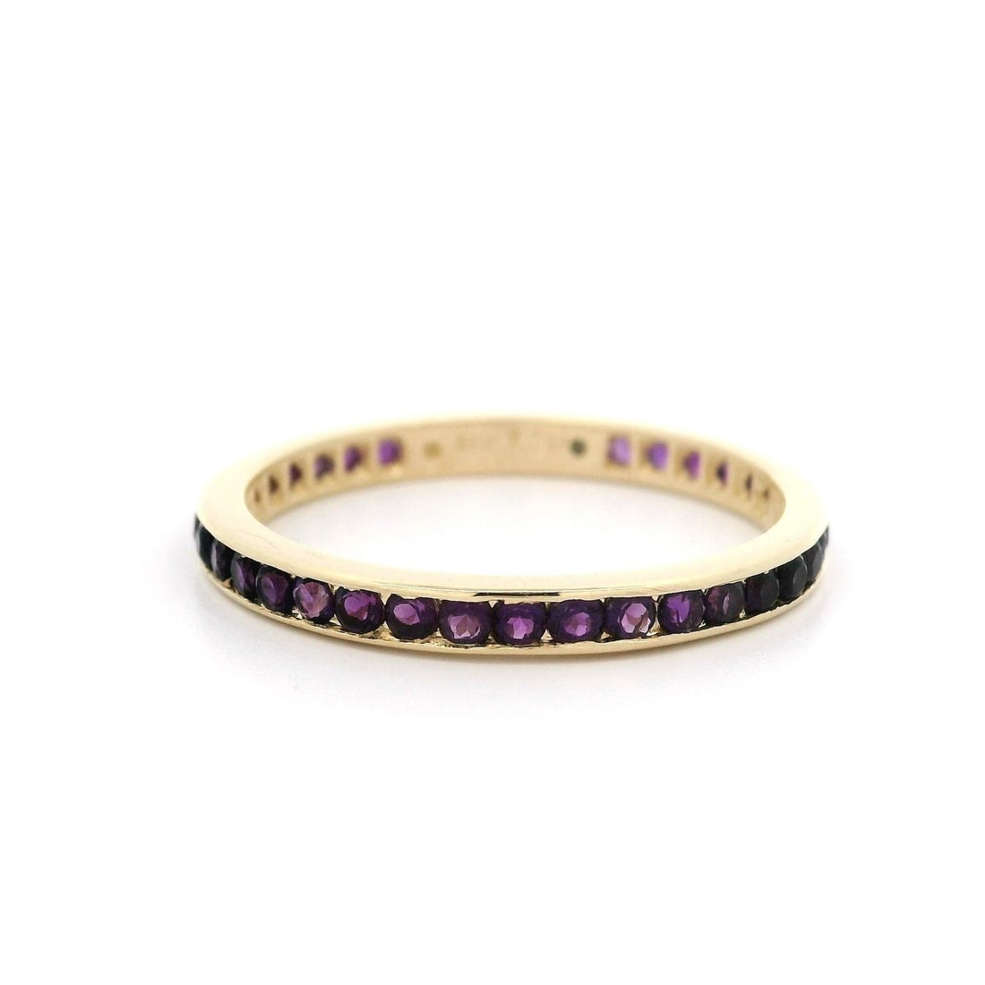 14k Yellow Gold 1.10ctw Round Amethyst Eternity Band Ring: 14k Yellow Gold 1.10ctw Round Amethyst Eternity Band Ring This stunning eternity band ring is crafted from solid 14k yellow gold and features 38 natural genuine amethysts, each in a round brilliant cu
