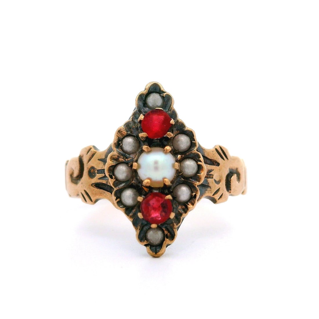 Victorian 9k Rosy Yellow Gold Seed Pearl Red Gemstone Cocktail Ring: Victorian 9k Rosy Yellow Gold Seed Pearl Red Gemstone Cocktail Ring This exquisite Antique Victorian cocktail ring features a stunning arrangement of genuine seed pearls and red gemstones. The ring is