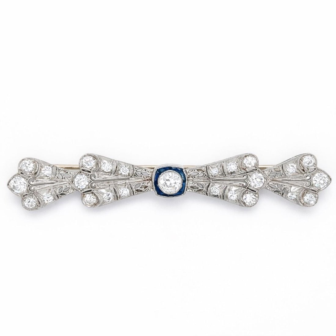 Platinum Art Deco Brooch with Diamonds and Sapphires 3 Inch: Platinum Art Deco Brooch with Diamonds and Sapphires 3 Inch This Art Deco brooch is crafted from platinum and features 25 diamonds with an approximate total weight of 2.75 carats, G-H color, and VVS-V