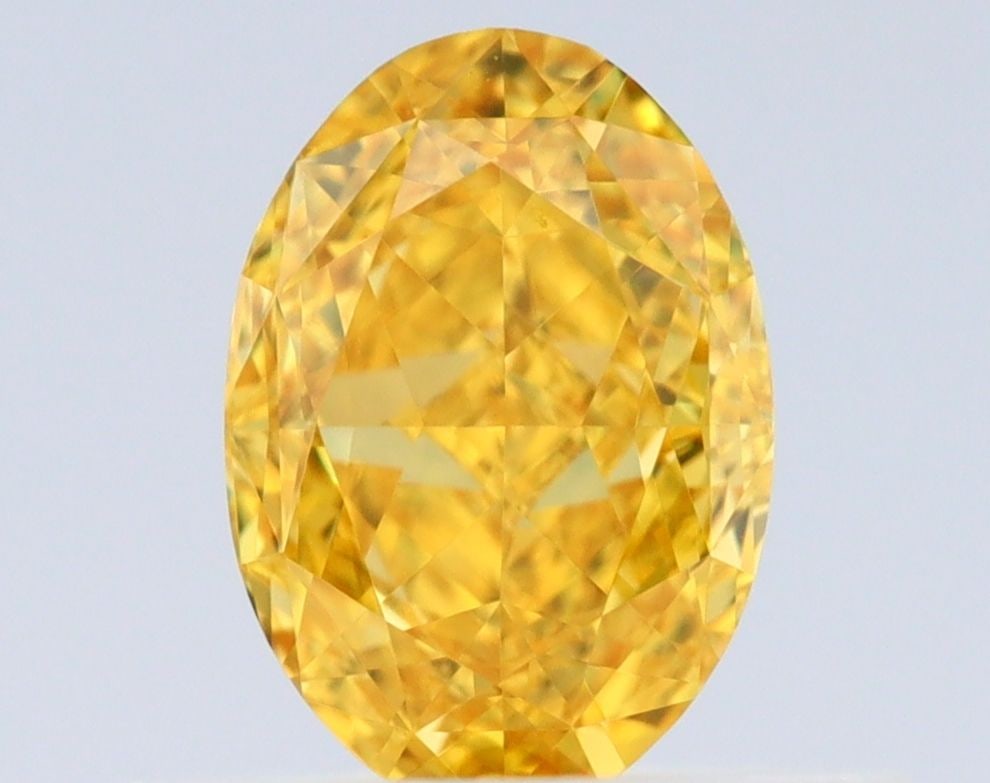Loose Diamond - OVAL 0.51ct Fancy Vivid Orangey Yellow VS2: Loose Diamond - OVAL 0.51ct Fancy Vivid Orangey Yellow VS2 Source: Natural Shape: OVAL Carats: 0.51 Color: Fancy Vivid Orangey Yellow Certification: GIA Video: