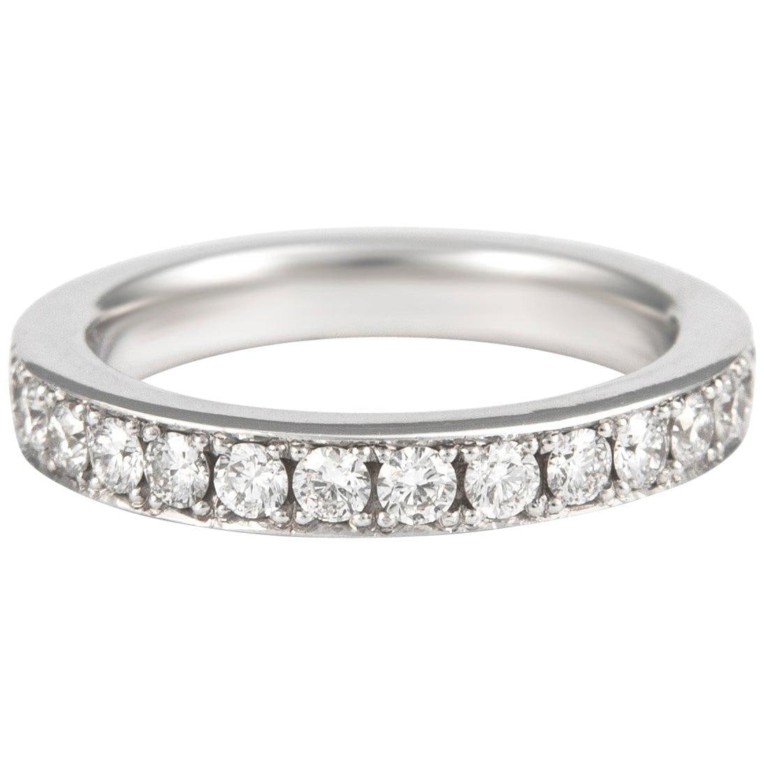 Diamond Eternity Band 1.26ct 18k White Gold Size 6: Diamond Eternity Band 1.26ct 18k White Gold Size 6 This exquisite diamond eternity band is crafted from 18 karat white gold and features a stunning array of 30 round brilliant diamonds totaling 1.26 c