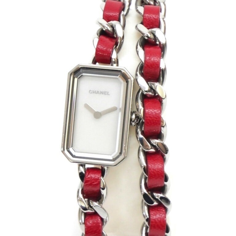 CHANEL Premiere Lock Quartz H5313 Ladies Watch Red Leather Strap: CHANEL Premiere Lock Quartz H5313 Ladies Watch Red Leather Strap This exquisite CHANEL Premiere Lock Quartz H5313 Ladies Watch showcases a harmonious blend of elegance and modern design. Crafted with 