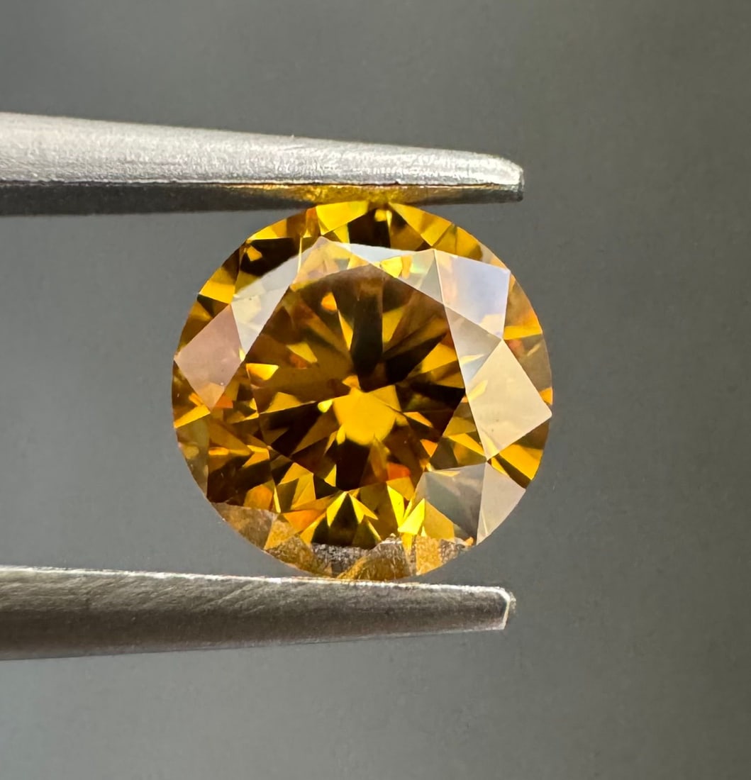 Loose Diamond - ROUND 0.5ct Fancy Deep Orange Yellow VS2: Loose Diamond - ROUND 0.5ct Fancy Deep Orange Yellow VS2 Source: Natural Shape: ROUND Carats: 0.5 Color: Fancy Deep Orange Yellow Certification: GIA Video: