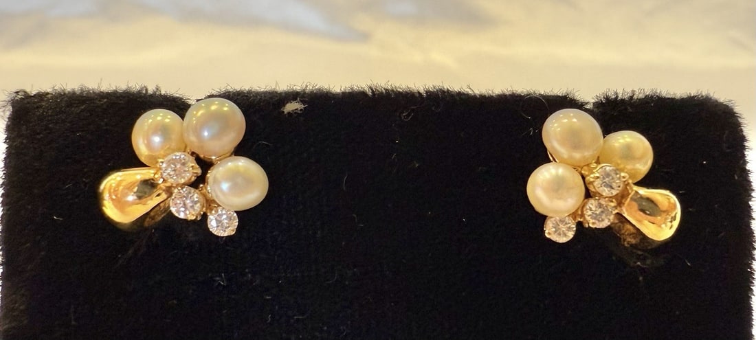French 18K Yellow Gold Diamond Pearl Stud Earrings: French 18K Yellow Gold Diamond Pearl Stud Earrings This exquisite pair of French earrings features a stunning combination of 18K yellow gold, diamonds, and pearls. The earrings are designed as elegant