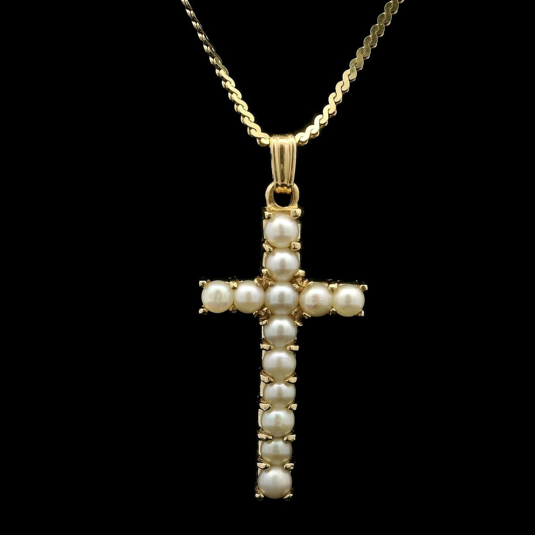 Unbranded 13-14K Yellow Gold Pearl Cross Pendant Necklace 23.5" Chain: Unbranded 13-14K Yellow Gold Pearl Cross Pendant Necklace 23.5" Chain This stunning Yellow Gold Round Pearl Cross Pendant features a beautiful design crafted from solid 13-14K yellow gold, elegantly s