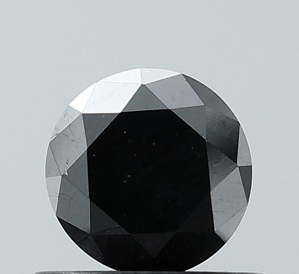 Loose Diamond - ROUND 0.72ct Fancy Black VS1: Loose Diamond - ROUND 0.72ct Fancy Black VS1 Source: Natural Shape: ROUND Carats: 0.72 Color: Fancy Black Certification: NONE Video:
