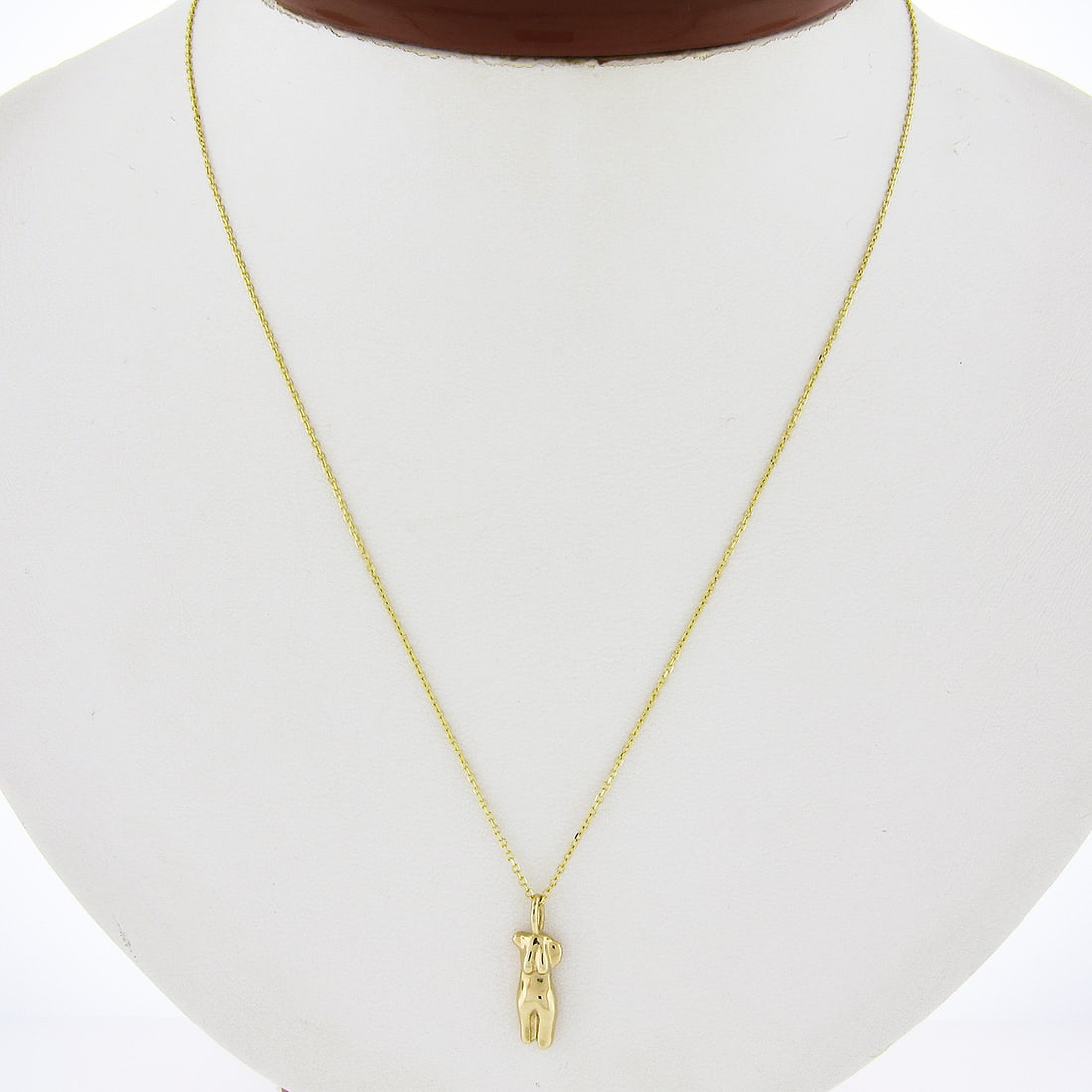 14K Yellow Gold Woman Charm Necklace 16 or 18 Inch Cable Chain: 14K Yellow Gold Woman Charm Necklace 16 or 18 Inch Cable Chain This un-used necklace features a 3D body of a woman charm crafted from solid 14k yellow gold. The pendant has a high-polished finish and 