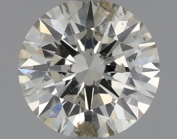 Loose Diamond - ROUND 0.71ct K SI2: Loose Diamond - ROUND 0.71ct K SI2 Source: Natural Shape: ROUND Carats: 0.71 Color: K Clarity: SI2 Certification: IGI Video: