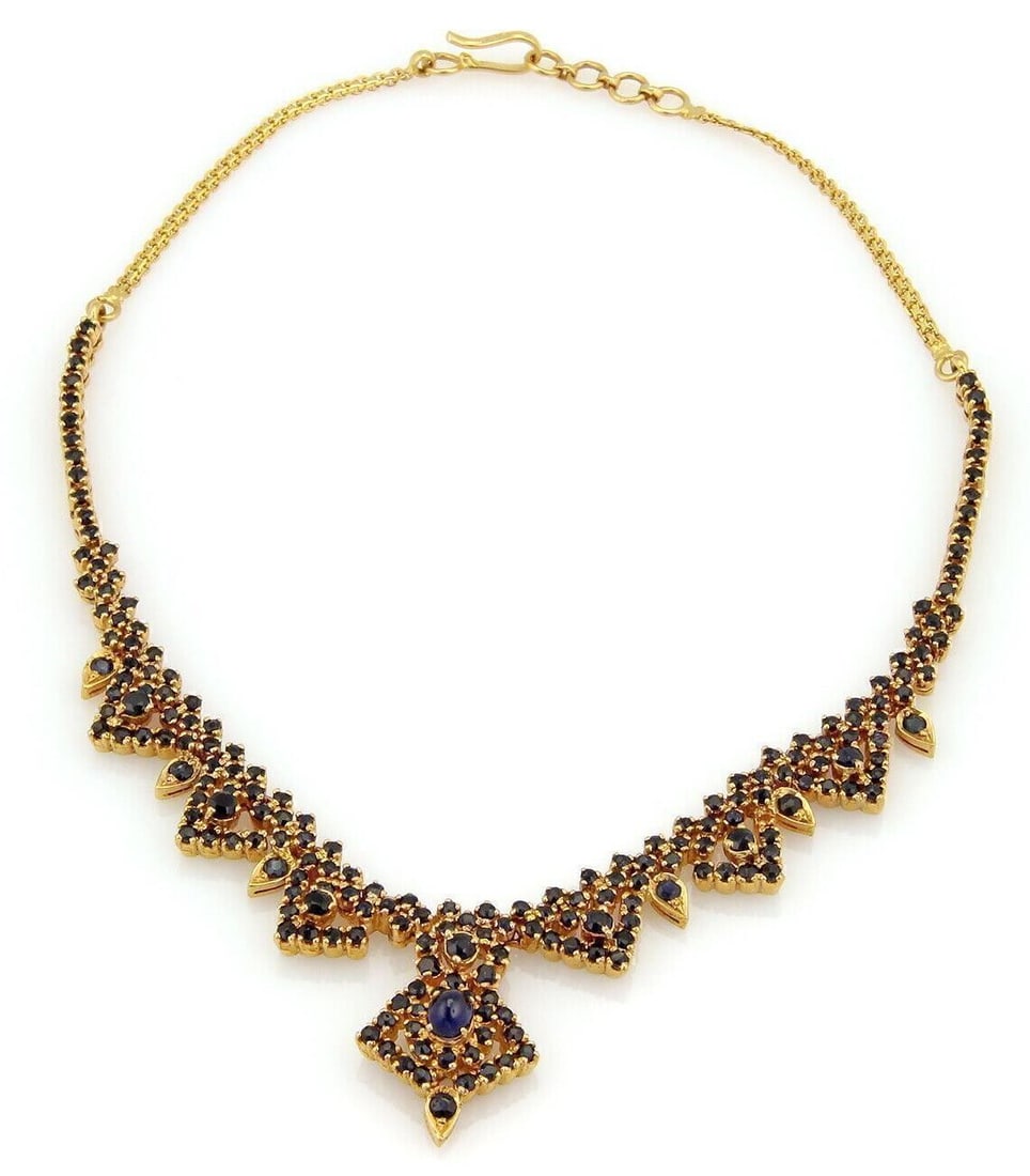 Vintage Unbranded 22k Gold Sapphire Choker Necklace 14.5": Vintage Unbranded 22k Gold Sapphire Choker Necklace 14.5" This vintage sapphire choker necklace is crafted in 22k gold and features blue sapphires in a graduated composition. It has a bold, sculptural