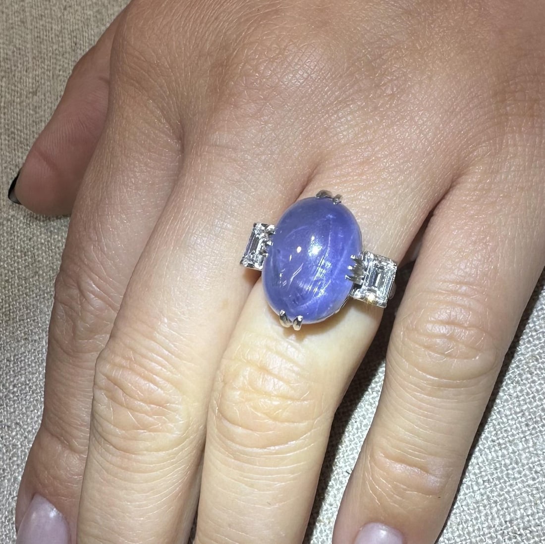 Vintage Platinum AGL 18.69ctw Color Change Sapphire Diamond Ring: Vintage Platinum AGL 18.69ctw Color Change Sapphire Diamond Ring This exquisite vintage cocktail ring showcases a stunning natural genuine star sapphire, featuring an oval cabochon cut that displays a