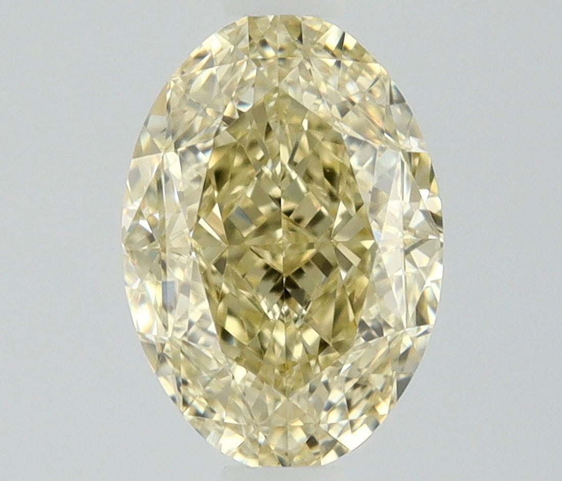 Loose Diamond - OVAL 0.7ct Fancy Light Yellow VS1: Loose Diamond - OVAL 0.7ct Fancy Light Yellow VS1 Source: Natural Shape: OVAL Carats: 0.7 Color: Fancy Light Yellow Certification: GIA Video: