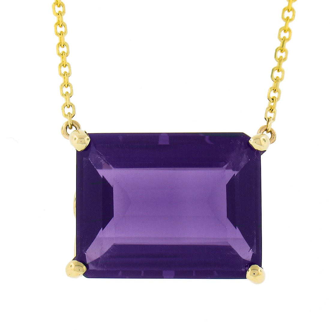14k Yellow Gold Amethyst Solitaire Pendant Necklace 8.0 ctw Adjustable Chain: 14k Yellow Gold Amethyst Solitaire Pendant Necklace 8.0 ctw Adjustable Chain This un-used pendant and chain set is crafted from solid 14k yellow gold and features a large, natural emerald-cut amethyst