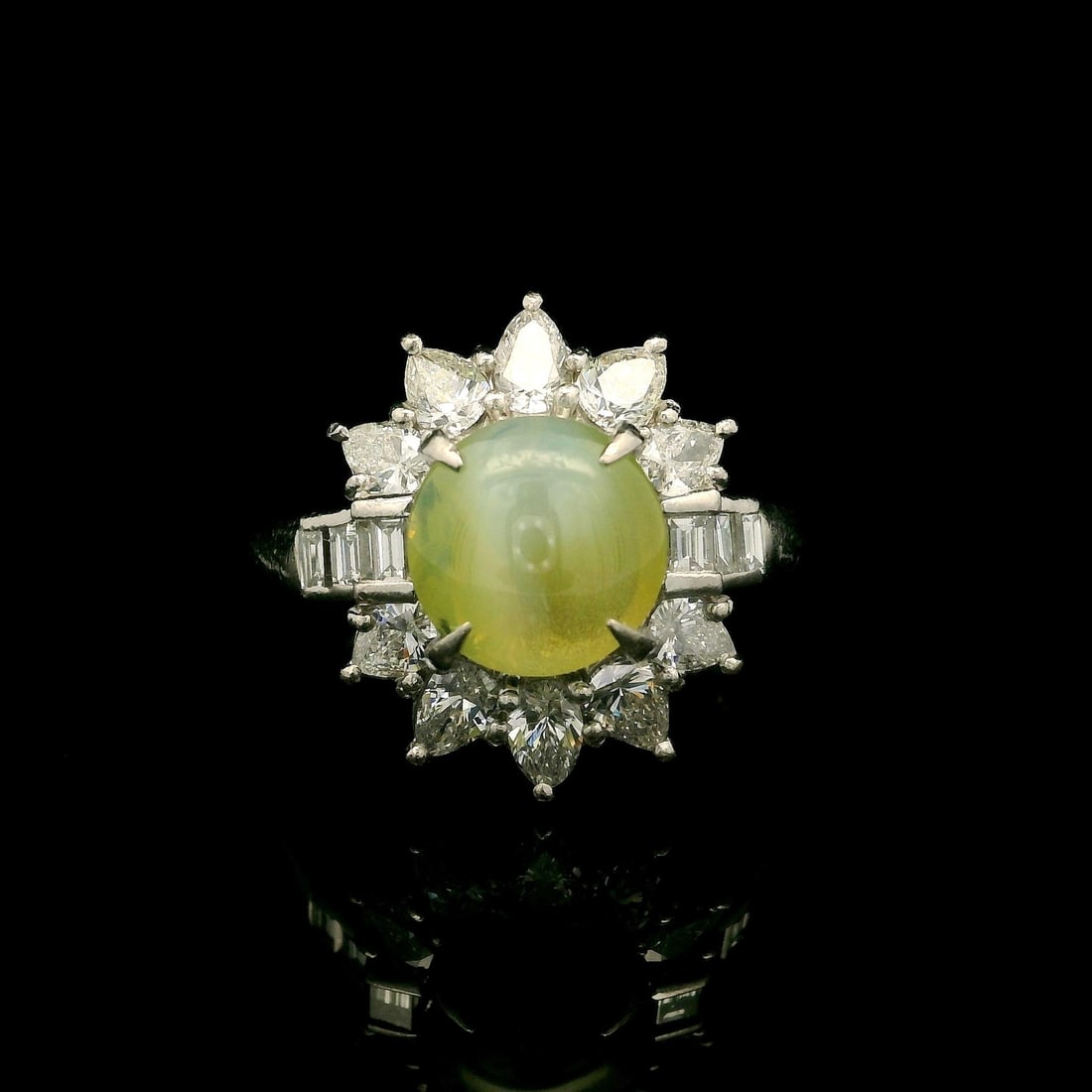 Vintage Platinum Cat's Eye Diamond Ring GIA Certified 4.52ct: Vintage Platinum Cat's Eye Diamond Ring GIA Certified 4.52ct This stunning vintage cocktail ring showcases a high-quality natural Cat's Eye gemstone, featuring a round double cabochon cut that exhibit