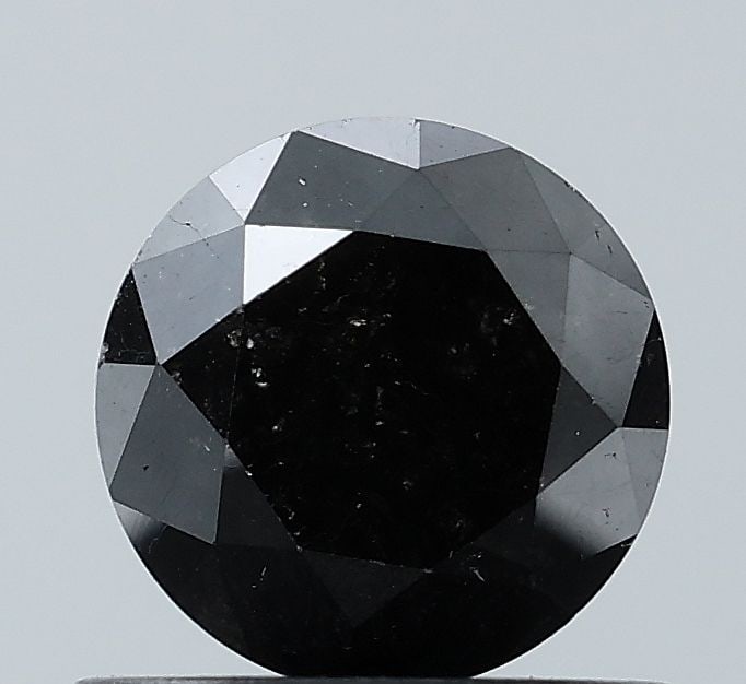 Loose Diamond - ROUND 0.9ct Black VS1: Loose Diamond - ROUND 0.9ct Black VS1 Source: Natural Shape: ROUND Carats: 0.9 Color: Black Certification: NONE Video: