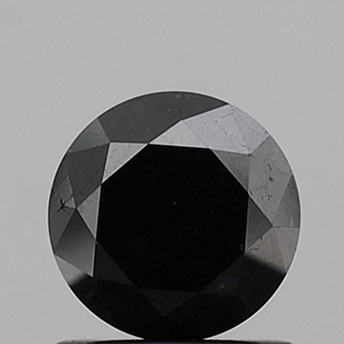 Loose Diamond - ROUND 1.18ct Fancy Black VS1: Loose Diamond - ROUND 1.18ct Fancy Black VS1 Source: Natural Shape: ROUND Carats: 1.18 Color: Fancy Black Certification: NONE Video: