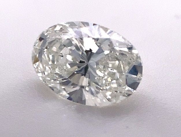 Loose Diamond - OVAL 0.98ct G SI2: Loose Diamond - OVAL 0.98ct G SI2 Source: Natural Shape: OVAL Carats: 0.98 Color: G Clarity: SI2 Certification: OTHER The Diamond Depot Guarantee: All items in this auction are guaranteed to be 100% a