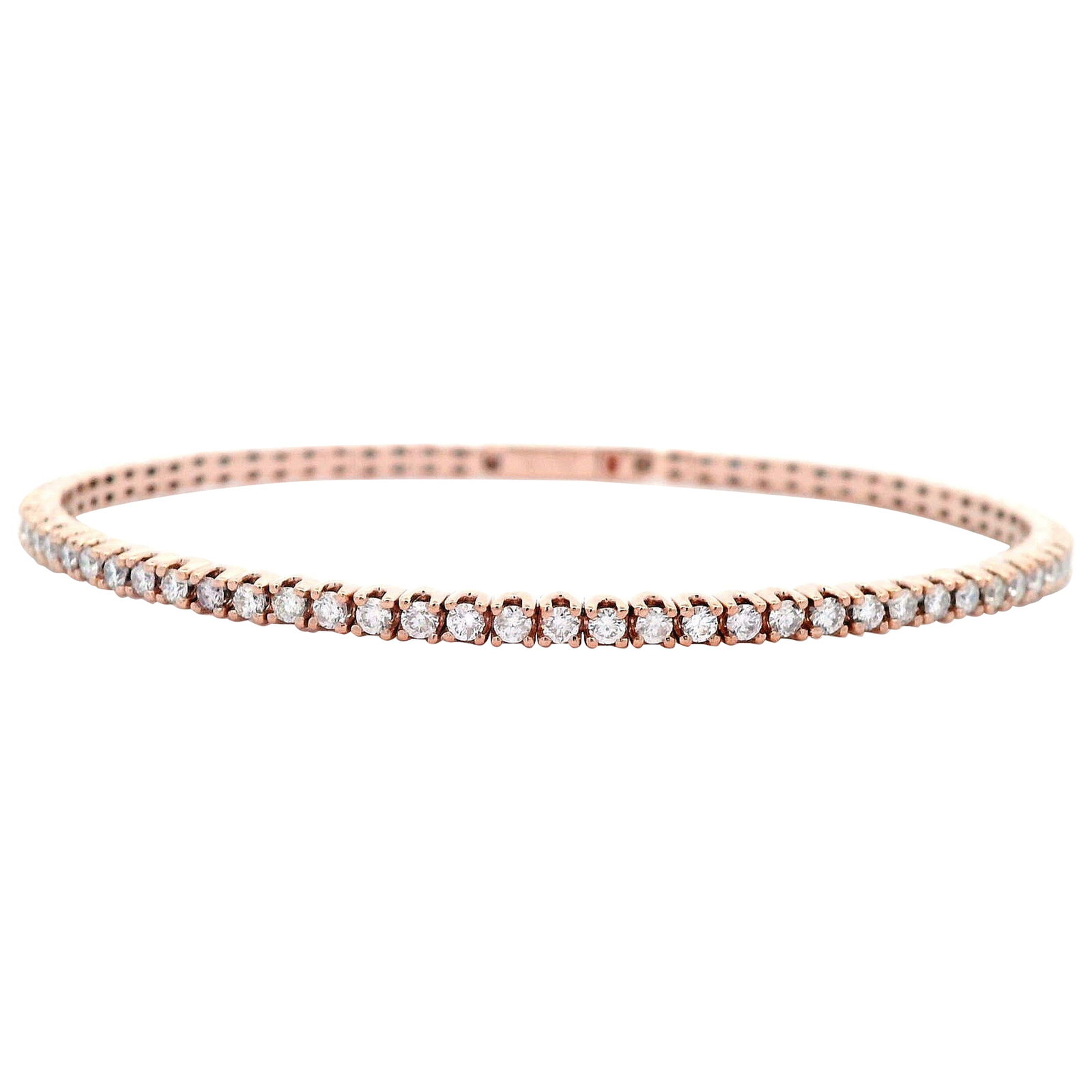 1.85ct Diamond Tennis Bangle Bracelet in 14k Rose Gold: 1.85ct Diamond Tennis Bangle Bracelet in 14k Rose Gold This exquisite flexible tennis bangle bracelet features a stunning array of 71 round diamonds totaling 1.85 carats, showcasing approximately E/F 