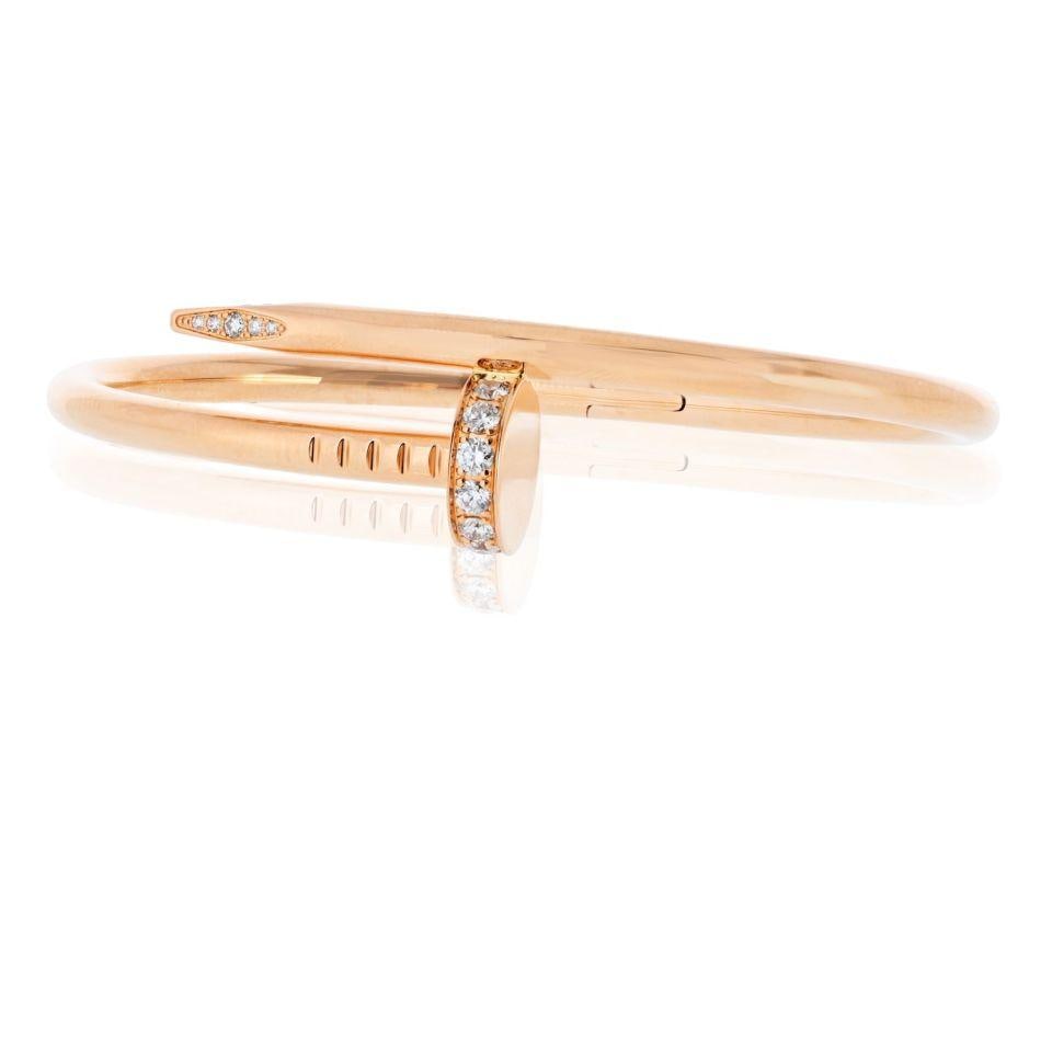Cartier Juste Un Clou 18K Rose Gold Diamond Bracelet Size 16: Cartier Juste Un Clou 18K Rose Gold Diamond Bracelet Size 16 This exquisite Cartier Juste Un Clou bracelet is crafted in 18K rose gold and features a striking design inspired by a nail. Sized at 16, i
