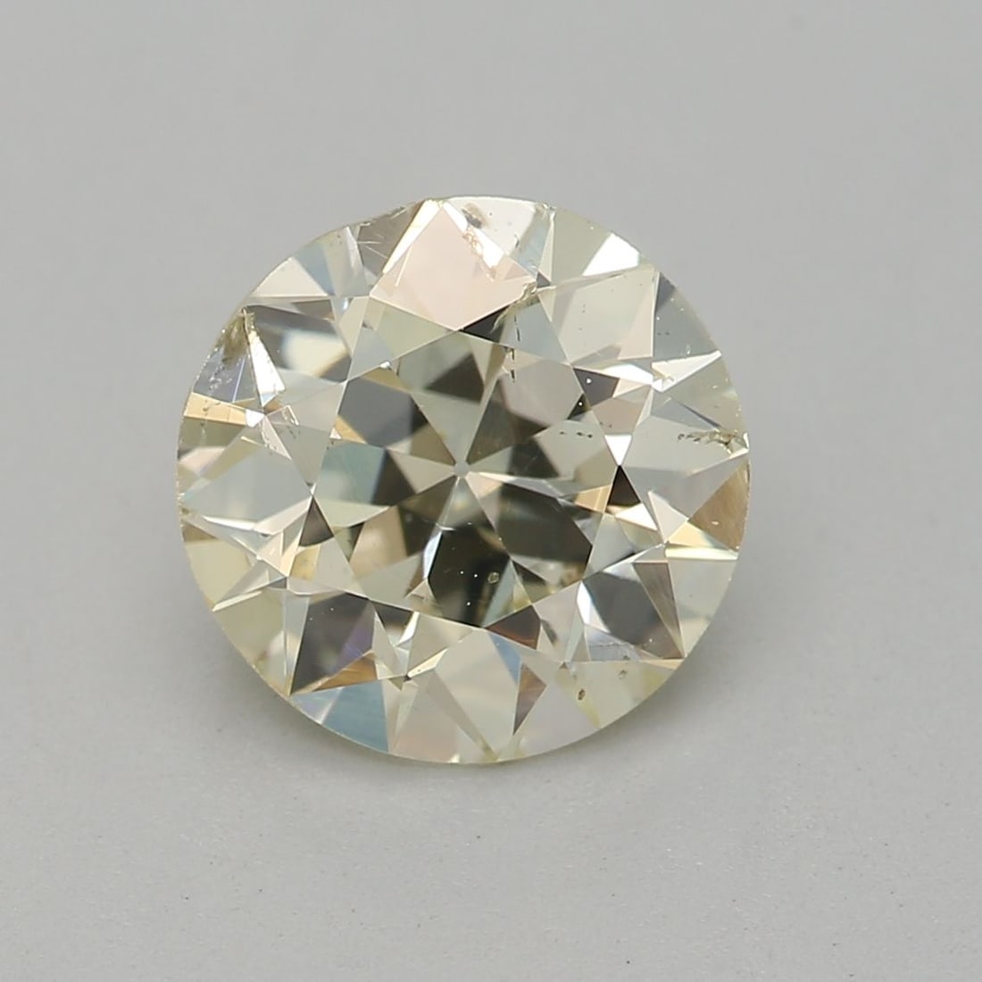 Loose Diamond - ROUND 1.07ct O-P SI2: Loose Diamond - ROUND 1.07ct O-P SI2 Source: Natural Shape: ROUND Carats: 1.07 Color: O-P Certification: GIA Video:
