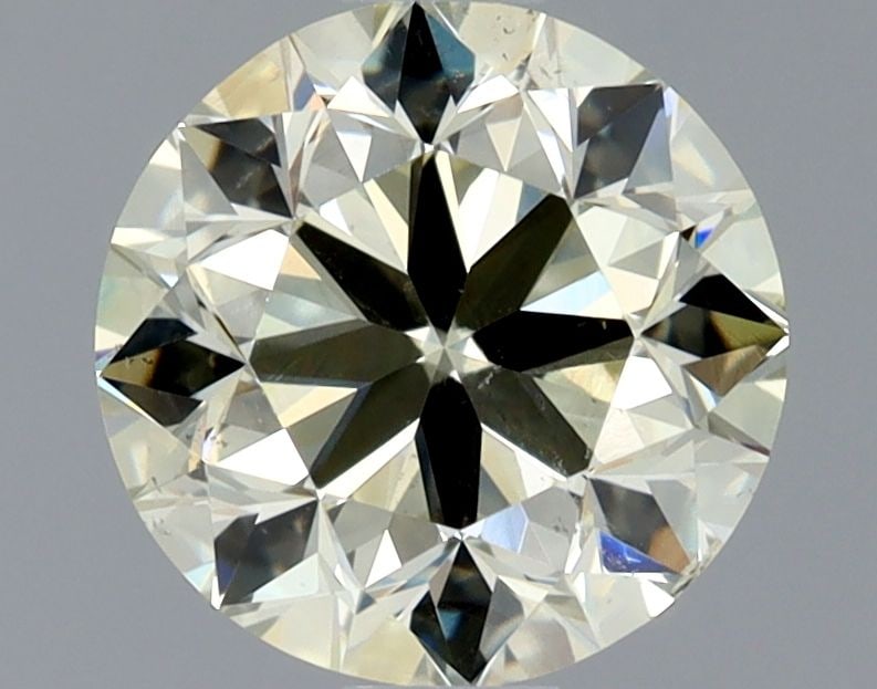 Loose Diamond - ROUND 0.9ct O-P SI1: Loose Diamond - ROUND 0.9ct O-P SI1 Source: Natural Shape: ROUND Carats: 0.9 Color: O-P Certification: GIA Video: