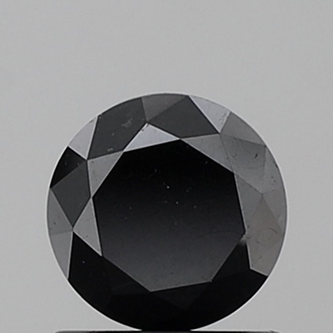 Loose Diamond - ROUND 1.11ct Fancy Black VVS2: Loose Diamond - ROUND 1.11ct Fancy Black VVS2 Source: Natural Shape: ROUND Carats: 1.11 Color: Fancy Black Certification: NONE Video: