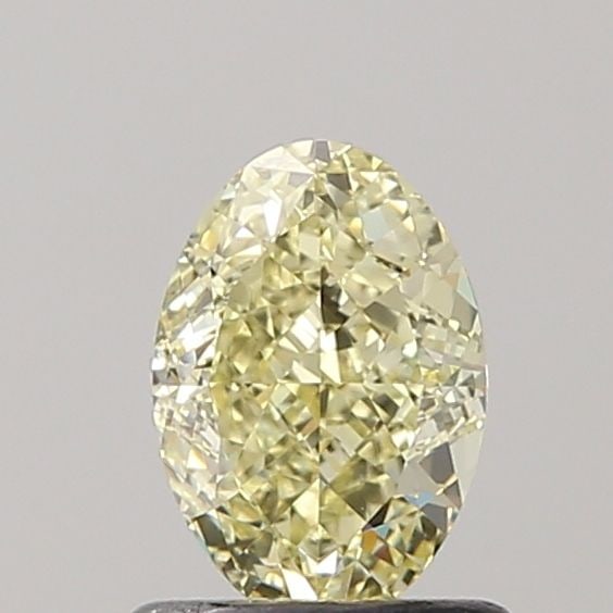Loose Diamond - OVAL 1.01ct Fancy Light Yellow VVS1: Loose Diamond - OVAL 1.01ct Fancy Light Yellow VVS1 Source: Natural Shape: OVAL Carats: 1.01 Color: Fancy Light Yellow Certification: GIA Video: