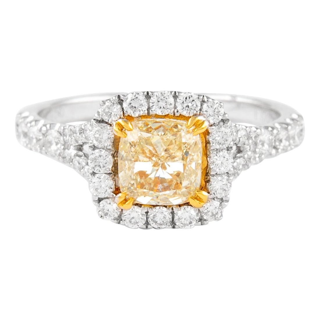 2.13ct Fancy Yellow Diamond Halo Ring 18k Gold EGL Certified: 2.13ct Fancy Yellow Diamond Halo Ring 18k Gold EGL Certified This stunning ring features a 2.13 carat Fancy Yellow Cushion Diamond with SI1 clarity, certified by EGL, set in a contemporary two-tone de