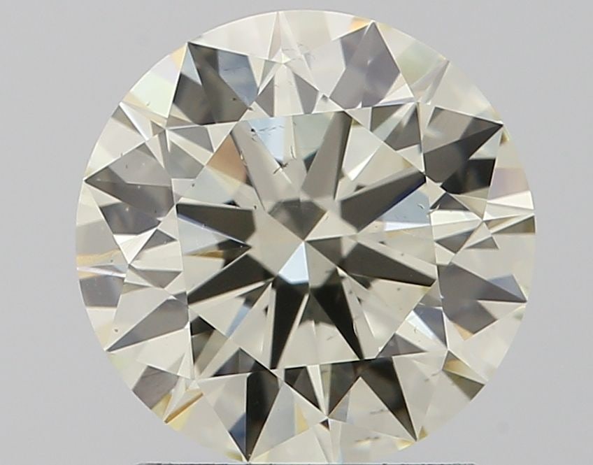 Loose Diamond - ROUND 1.71ct K VS2: Loose Diamond - ROUND 1.71ct K VS2 Source: Natural Shape: ROUND Carats: 1.71 Color: K Clarity: VS2 Certification: IGI Video: