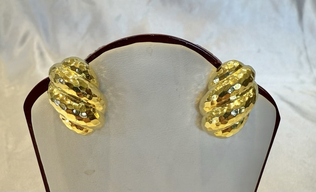 David Webb 18K Yellow Gold Cuff Earrings Pair: David Webb 18K Yellow Gold Cuff Earrings Pair Discover the elegance of these exquisite David Webb 18K yellow gold earrings. Crafted with meticulous hand-hammered detail, these cuff pierce earrings sho