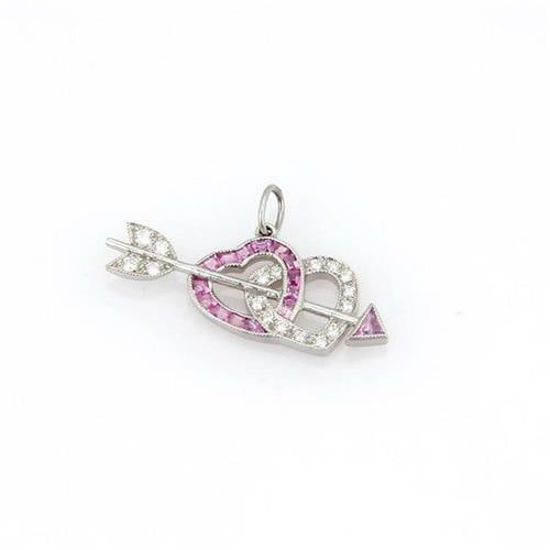 Tiffany & Co. Diamond Pink Sapphire Platinum Hearts Pendant: Tiffany & Co. Diamond Pink Sapphire Platinum Hearts Pendant This exquisite pendant from Tiffany & Co. showcases a unique arrow design interlaced through double hearts. Crafted from 950 platinum, one h