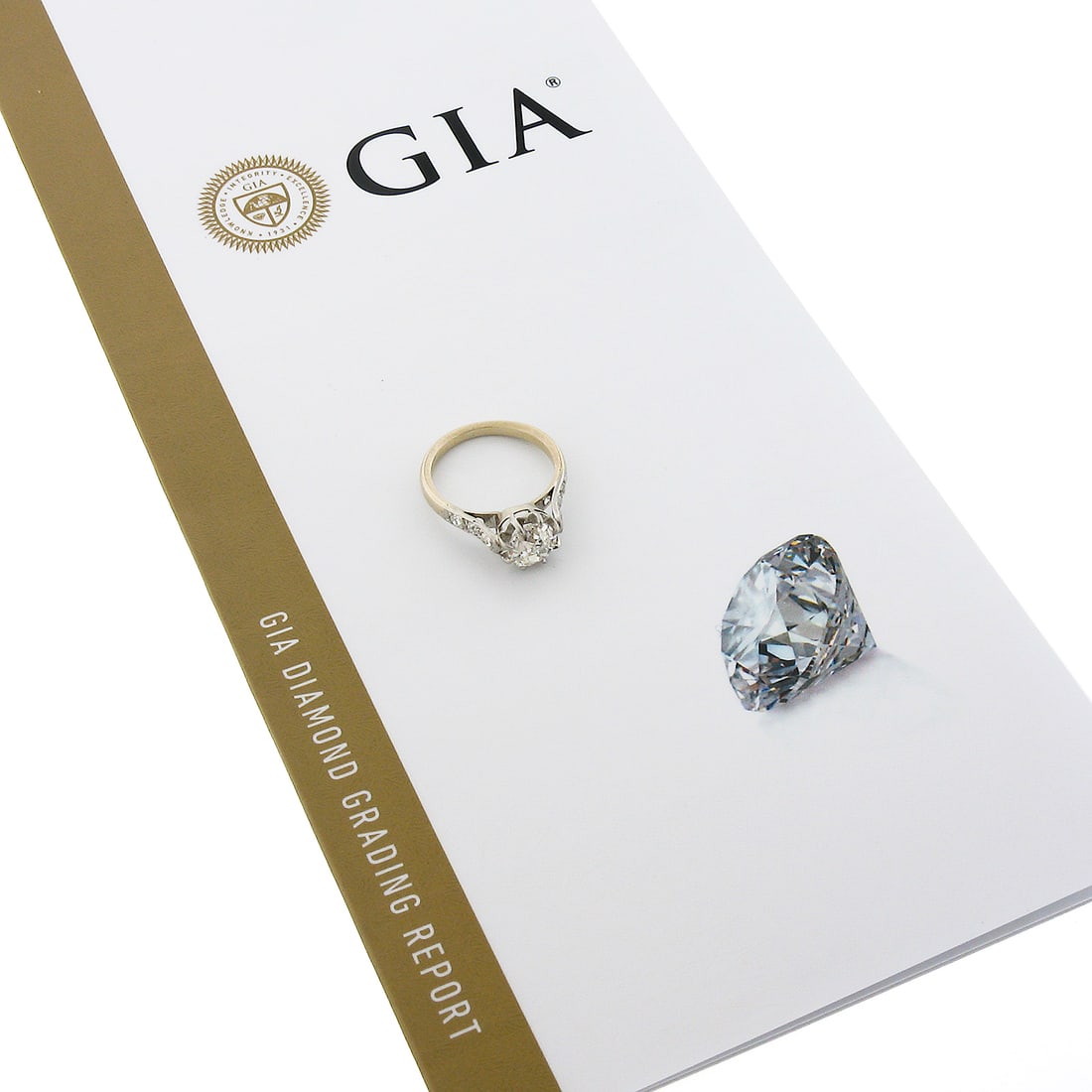 GIA Certified Edwardian French 18k Platinum Diamond Solitaire Ring: GIA Certified Edwardian French 18k Platinum Diamond Solitaire Ring This antique Edwardian engagement ring was crafted in France from solid 18k white gold and platinum. It features a GIA-certified natu