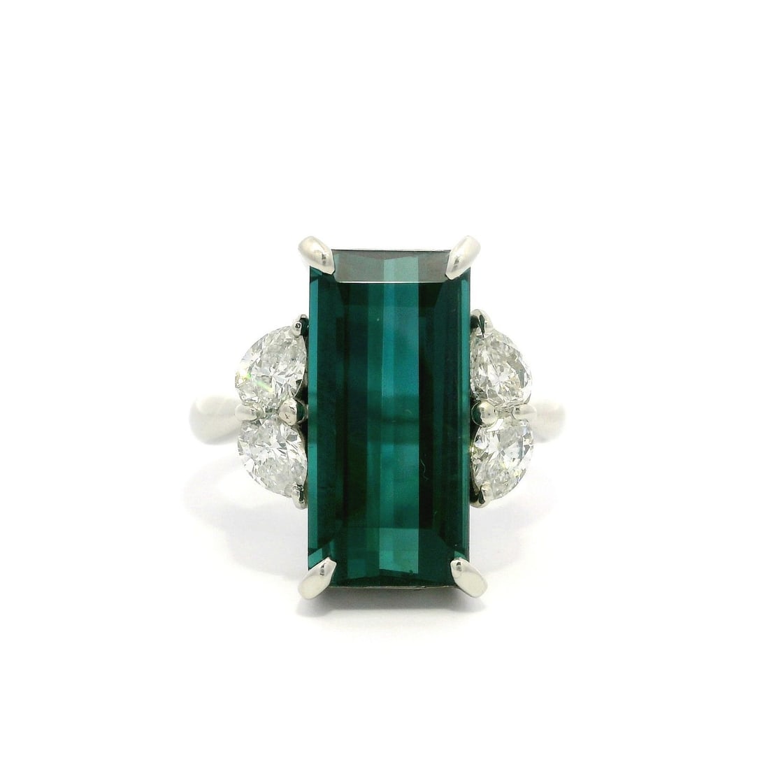 Platinum GIA 7.57ct Long Emerald Cut Indicolite Blue Tourmaline Diamond Cocktail Ring: Platinum GIA 7.57ct Long Emerald Cut Indicolite Blue Tourmaline Diamond Cocktail Ring This exquisite cocktail ring features a stunning elongated emerald cut natural Indicolite blue tourmaline, weighin