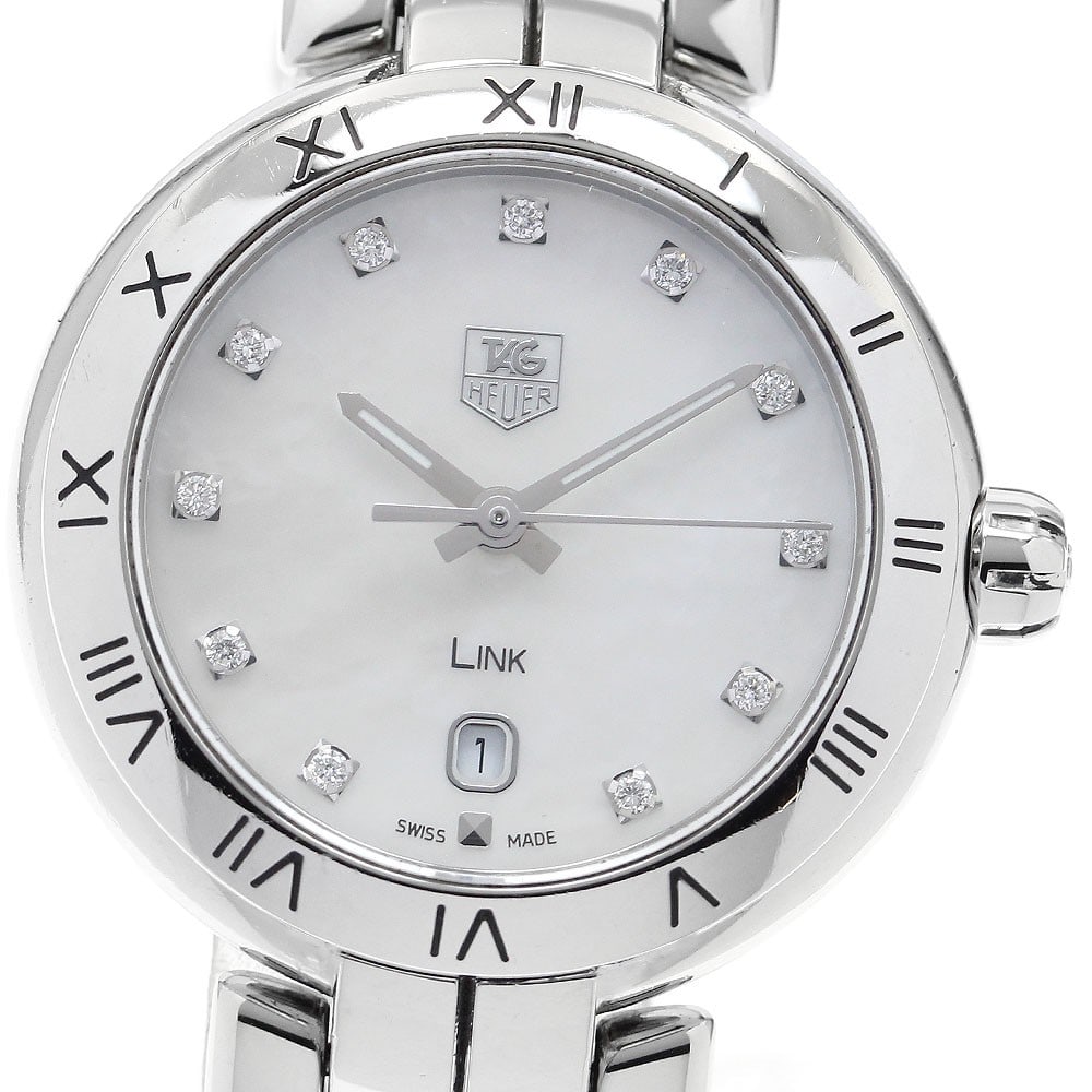 TAG Heuer Link Quartz Ladies Steel Watch WAT1417.BA0954 11 Diamonds: TAG Heuer Link Quartz Ladies Steel Watch WAT1417.BA0954 11 Diamonds This TAG Heuer Link women's wristwatch, model WAT1417.BA0954, features a stainless steel case and bracelet with a white mother-of-pe