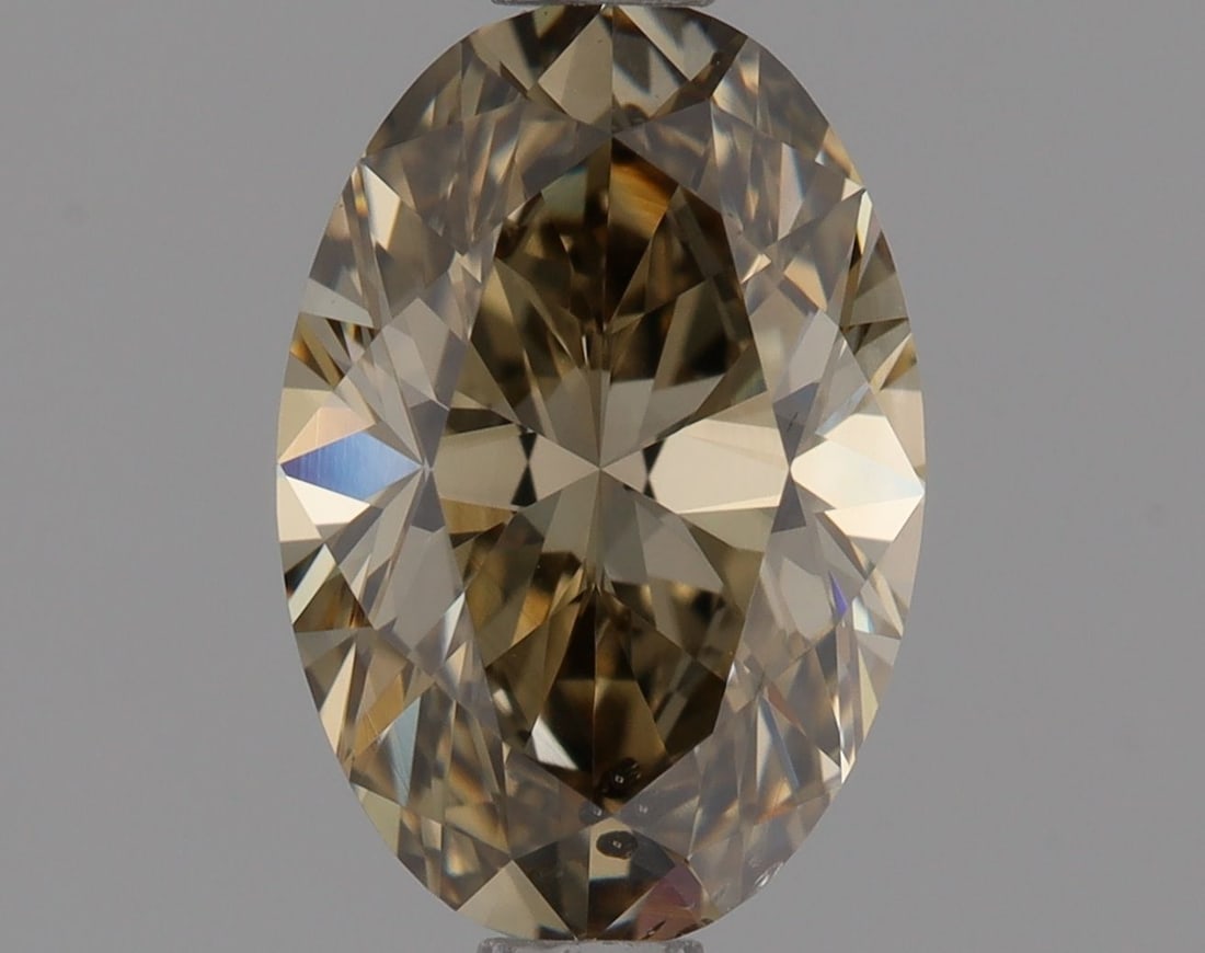 Loose Diamond - OVAL 1.01ct Fancy Dark Yellowish Brown SI2: Loose Diamond - OVAL 1.01ct Fancy Dark Yellowish Brown SI2 Source: Natural Shape: OVAL Carats: 1.01 Color: Fancy Dark Yellowish Brown Certification: GIA Video:
