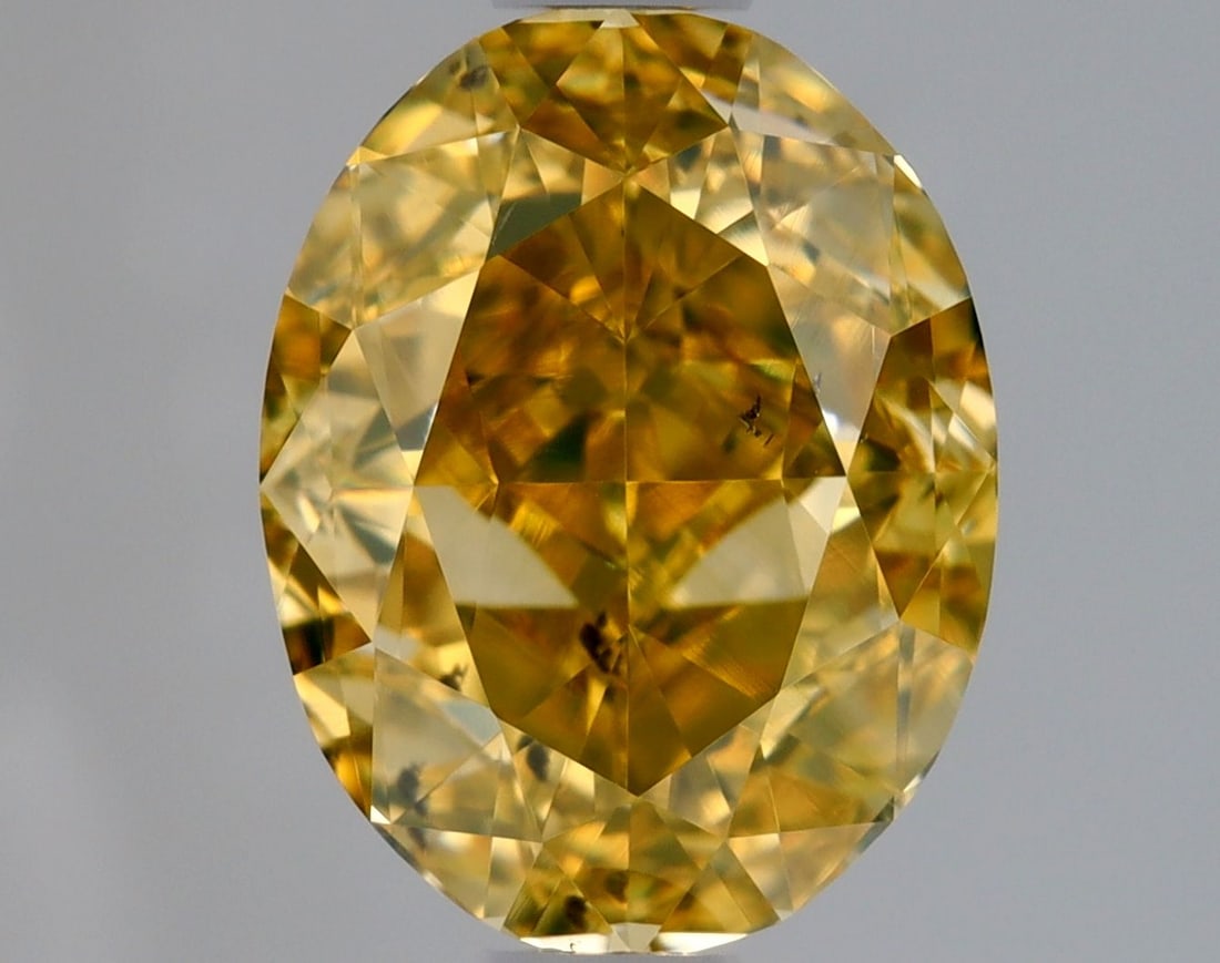 Loose Diamond - OVAL 1.57ct Fancy Brownish Orangey Yellow SI2: Loose Diamond - OVAL 1.57ct Fancy Brownish Orangey Yellow SI2 Source: Natural Shape: OVAL Carats: 1.57 Color: Fancy Brownish Orangey Yellow Certification: GIA Video: