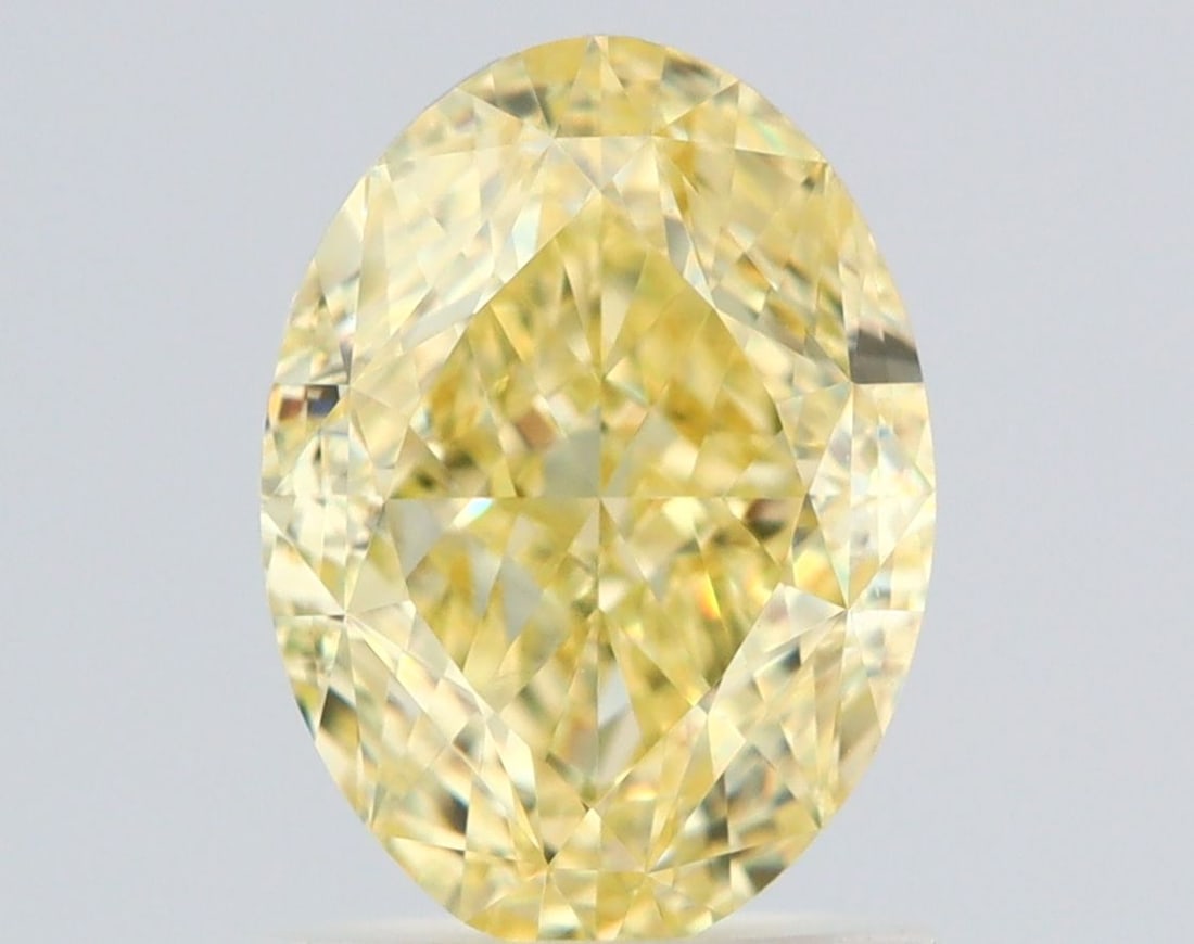 Loose Diamond - OVAL 1.5ct Fancy Yellow VVS2: Loose Diamond - OVAL 1.5ct Fancy Yellow VVS2 Source: Natural Shape: OVAL Carats: 1.5 Color: Fancy Yellow Certification: GIA Video: