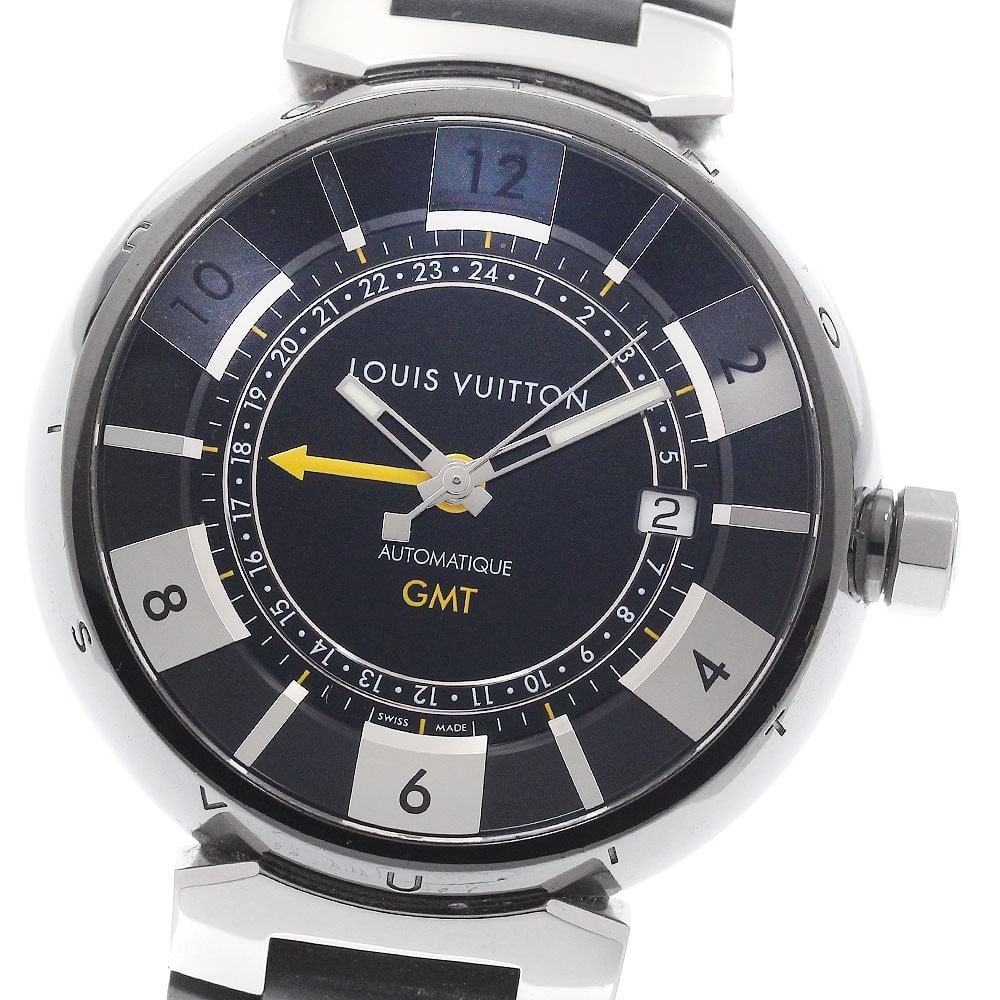 Mens Automatic GMT Wristwatch Louis Vuitton Tambour Q113I Black: Mens Automatic GMT Wristwatch Louis Vuitton Tambour Q113I Black A pre-owned men's Louis Vuitton Tambour GMT automatic wristwatch in black. Swiss-made and presented as a wristwatch, this model combines