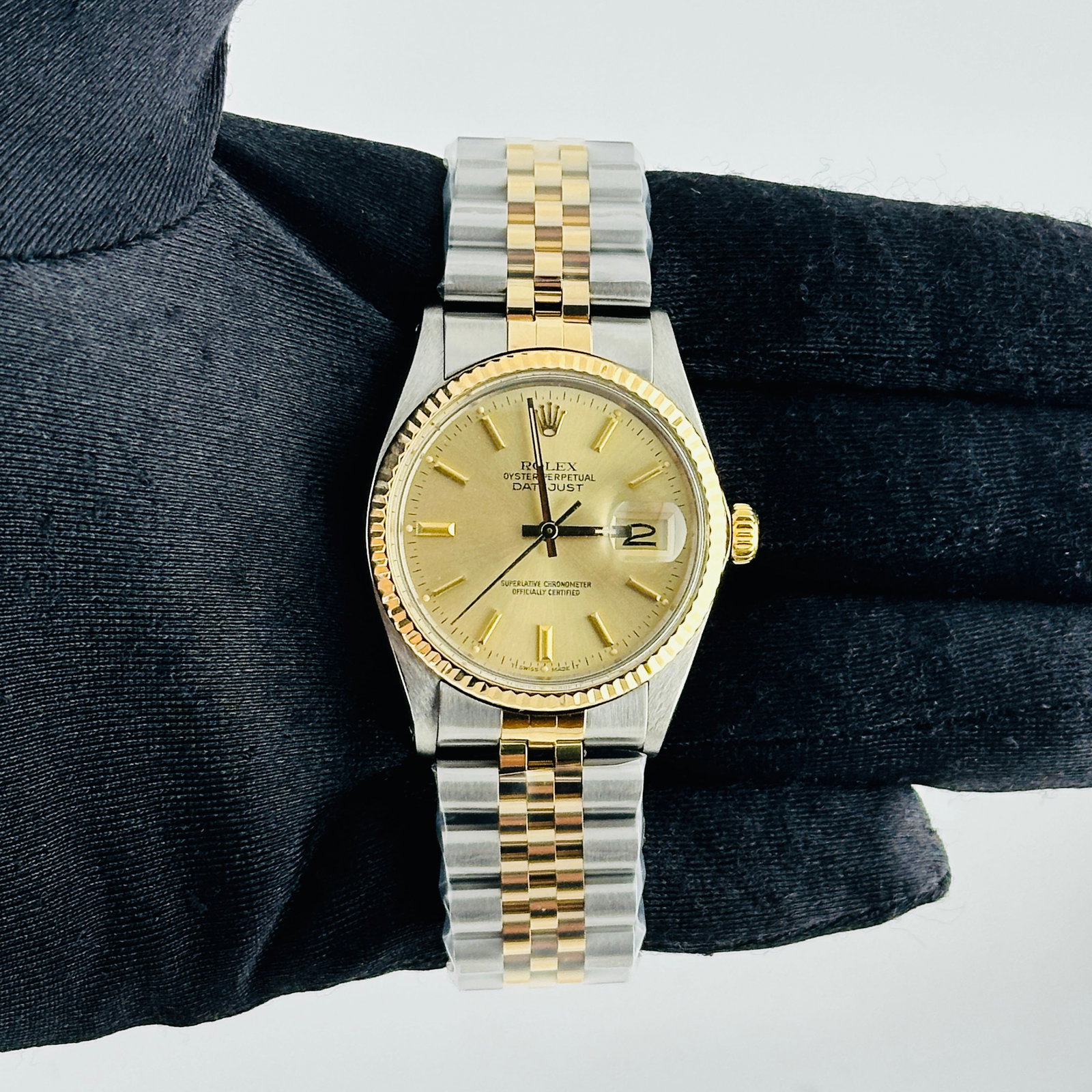 Rolex Datejust Ref 16013 Champagne Stick Dial Mens Watch with Aftermarket Jubilee Bracelet: Rolex Datejust Ref 16013 Champagne Stick Dial Mens Watch with Aftermarket Jubilee Bracelet This Rolex Datejust features a champagne stick dial, fluted bezel, and is paired with an aftermarket Jubilee 