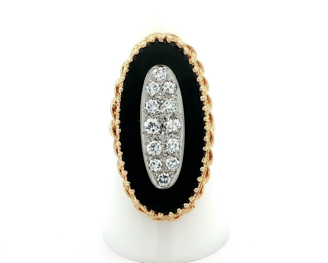 Vintage 14k Gold Black Onyx Diamond Cocktail Ring 0.60ctw: Vintage 14k Gold Black Onyx Diamond Cocktail Ring 0.60ctw This exquisite vintage ring features a stunning oval cabochon black onyx centerpiece, measuring approximately 30x14.9mm, elegantly prong set i