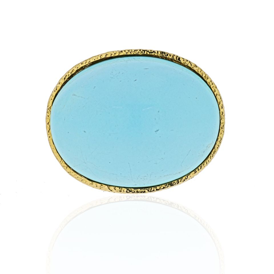 David Webb Vintage Platinum 18K Gold Turquoise Ring Signed WEBB: David Webb Vintage Platinum 18K Gold Turquoise Ring Signed WEBB This exquisite vintage ring by David Webb features a stunning light blue turquoise cabochon, beautifully bezel set in luxurious 18K yell