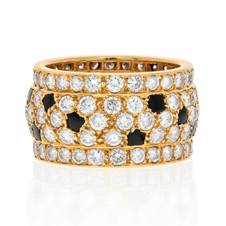 Cartier 18K Yellow Gold Onyx Diamond Ring Size 7: Cartier 18K Yellow Gold Onyx Diamond Ring Size 7 This exquisite Cartier ring features a striking design crafted from 18K yellow gold. The ring showcases a wide band that is elegantly paved with round 