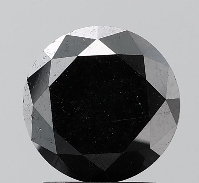 Loose Diamond - ROUND 2.66ct Fancy Black VS2: Loose Diamond - ROUND 2.66ct Fancy Black VS2 Source: Natural Shape: ROUND Carats: 2.66 Color: Fancy Black Certification: NONE Video: