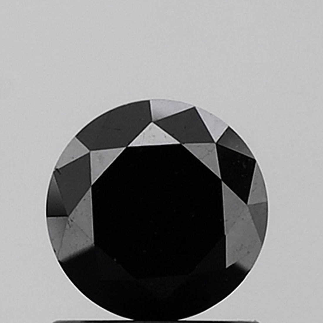 Loose Diamond - ROUND 1.18ct Fancy Black VS2: Loose Diamond - ROUND 1.18ct Fancy Black VS2 Source: Natural Shape: ROUND Carats: 1.18 Color: Fancy Black Certification: NONE Video: