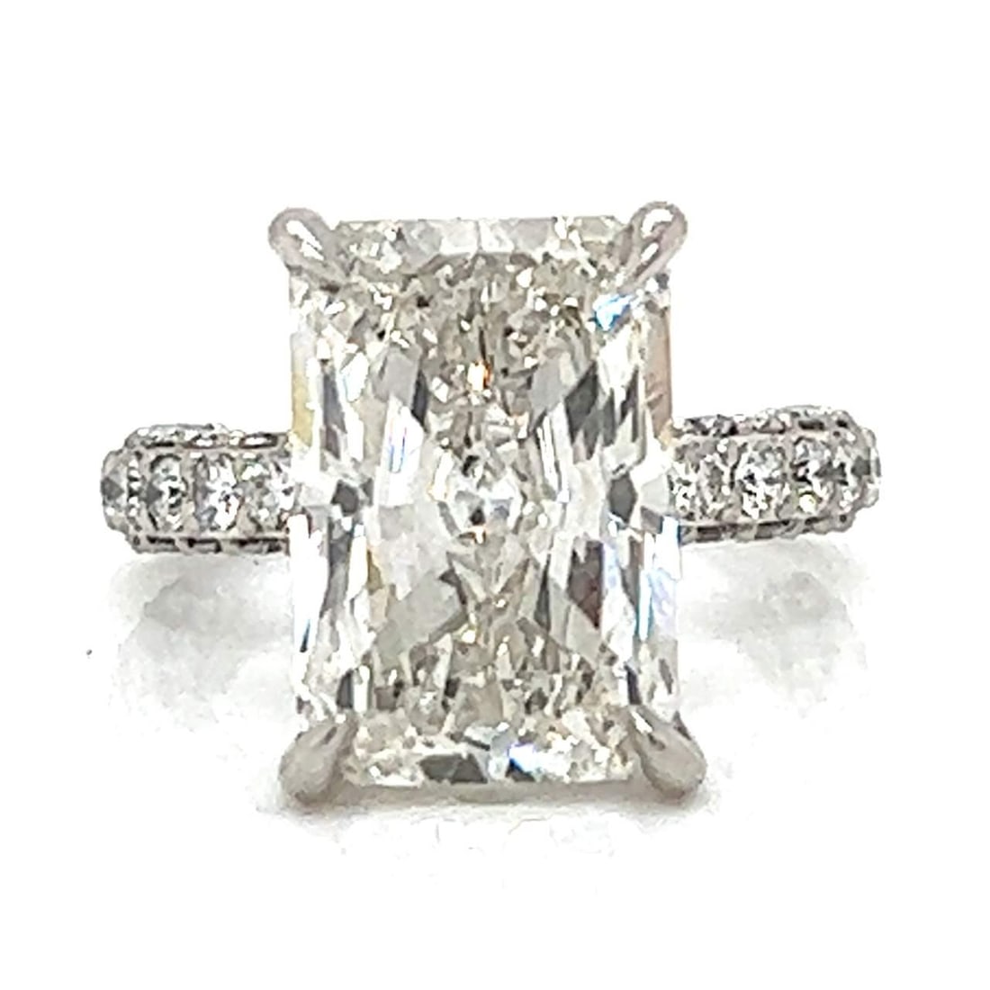 Platinum 8.01 Ct IGI Certified Emerald Cut Lab Grown Diamond Ring: Platinum 8.01 Ct IGI Certified Emerald Cut Lab Grown Diamond Ring This exquisite ring features an 8.01 Ct. IGI Certified Lab Grown Diamond, elegantly set in platinum. The diamond is cut in an emerald 