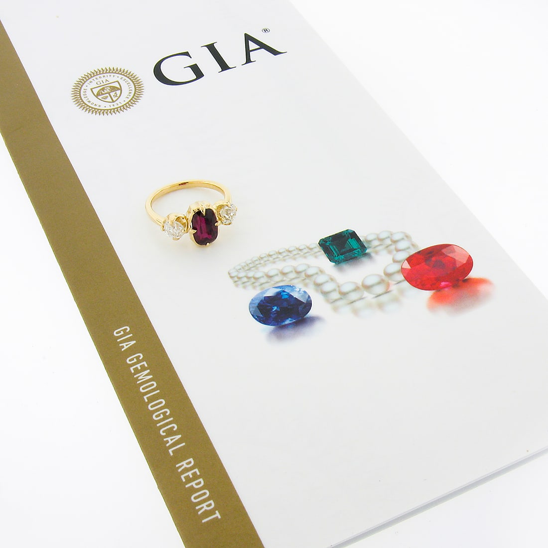 18k Yellow Gold GIA Certified 3.37ct Ruby Diamond Engagement Ring: 18k Yellow Gold GIA Certified 3.37ct Ruby Diamond Engagement Ring This exquisite engagement ring showcases a stunning 2.19ct GIA certified elongated cushion cut ruby, elegantly prong set in solid 18k 